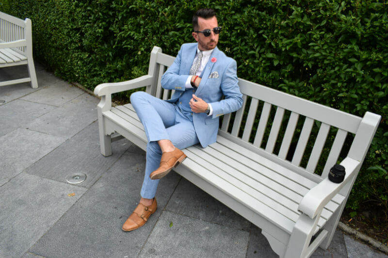 Summer Suit Posing in a linen suit on a bench