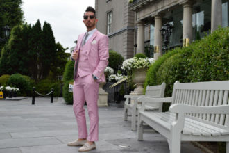 Posing in a pink suit